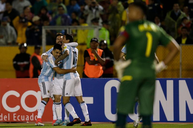 Lionel Messi, centre, celebrates after scoring against Ecuador. Dolores Ochoa / AP Photo