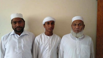 Mohammed Pervez, 15, centre, and his grandfather, Mohammad Idrish, right; and fatherMohammad Aftab Alam, left. Courtesy Mohammad Aftab Alam