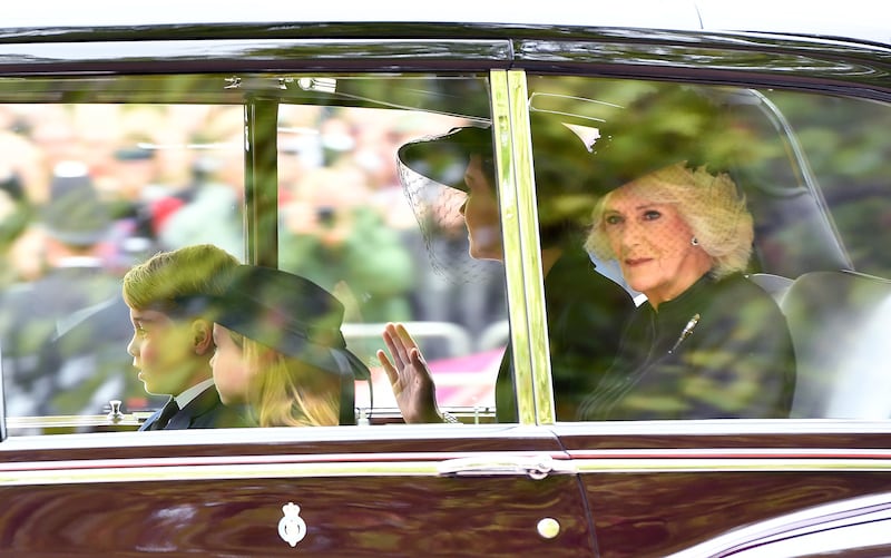 Catherine, Princess of Wales, and the queen consort are driven down The Mall in central London before the state funeral of Queen Elizabeth II in September 2022