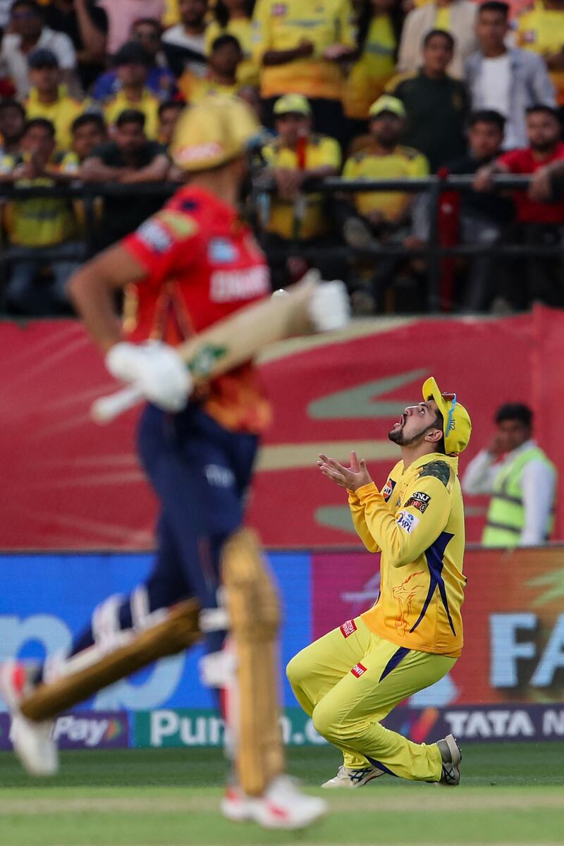 Chennai Super Kings fielder Sameer Rizvi takes a catch to dismiss Punjab Kings' Harshal Patel for 12. AFP