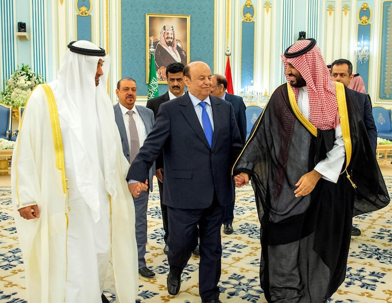 epa07974552 A handout photo made available by Saudi Royal Court shows Crown Prince of Abu Dhabi and Deputy Supreme Commander of the UAE Armed Forces Sheikh Mohammad bin Zayed Al Nahyan (L), Saudi Crown Prince Mohammed bin Salman (R) and Yemeni President Abedrabbo Mansour Hadi (C) arriving to witness the signing of the Riyadh Agreement between the Southern Transitional Council and the Yemeni government, in Riyadh, Saudi Arabia, 05 November 2019. The Yemeni government and the Southern Transitional Council (STC) signed a power-sharing deal that includes giving STC representation in the government, and allowing Yemeni prime minister to assume his duties from Aden.  EPA/BANDAR ALJALOUD HANDOUT  HANDOUT EDITORIAL USE ONLY/NO SALES