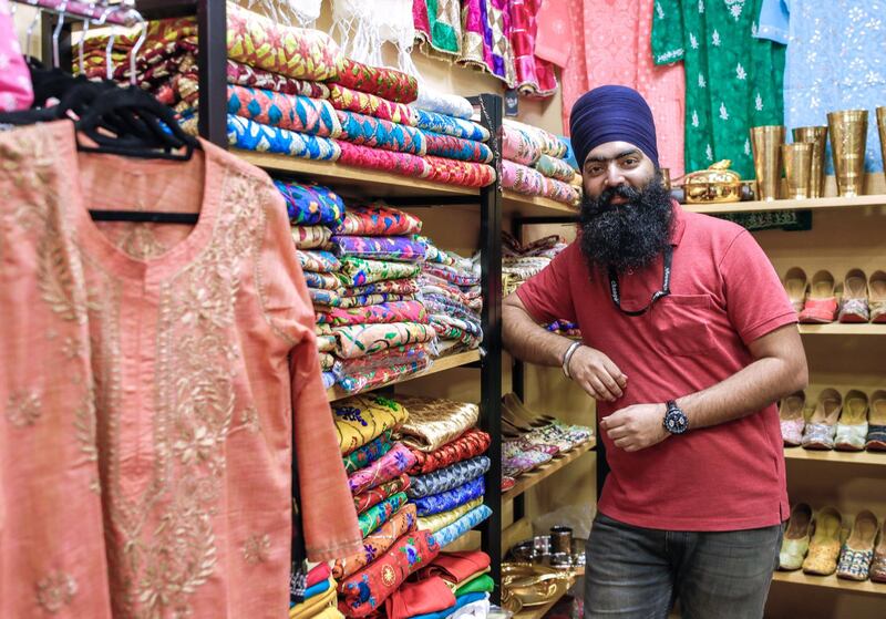 Abu Dhabi, United Arab Emirates, January 5, 2020.  
Photo essay of Global Village.
--  Deepinder Sing, 32, India. Has been been in the Indian hand embroidery apparels business for five years now, he has just opened Changé Shop at the India Pavillion for a year now.
Victor Besa / The National
Section:  WK
Reporter:  Katy Gillett