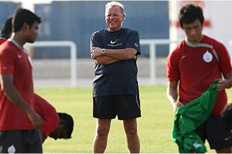India coach Bob Houghton, centre, overlooks a training session in Dubai. He wants his team to be prepared for the 2011 Asian Cup so he plans to keep his team together for eight months prior to the tournament.