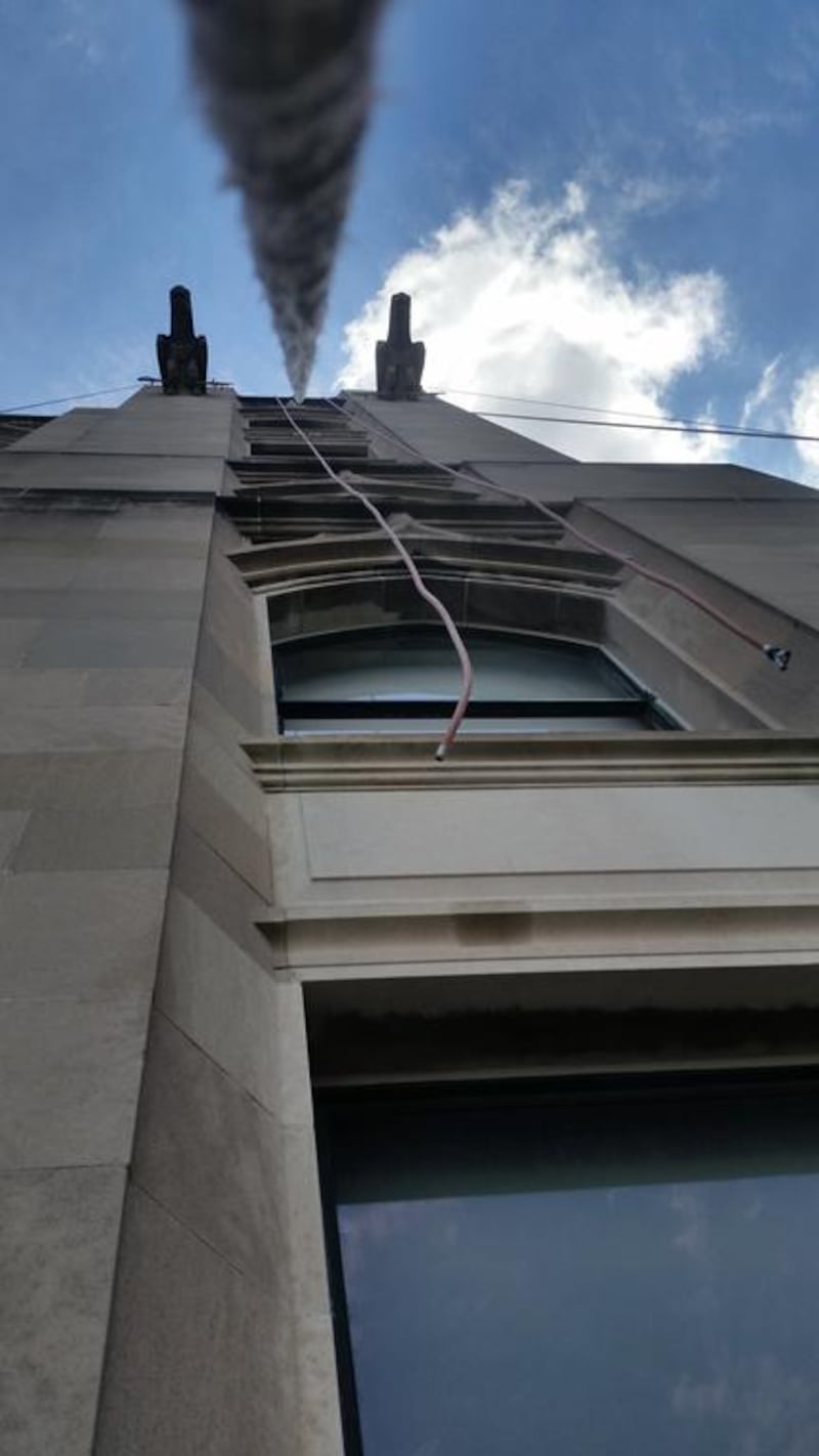 Lowering a safety line during rigging in the Flatiron district of Manhattan. John S Moller