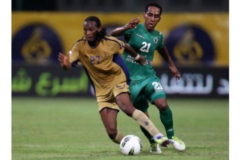 Adel Abdullah in action, right, for Al Shabab.