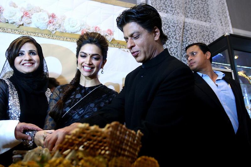 Shah Rukh Khan and Deepika Padukone promoting  their new movie  "Chennai Express'  visits  Studio8  in Dubai in August. Satish Kumar / The National