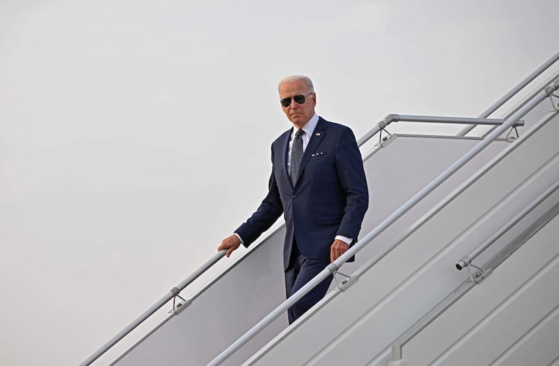 Mr Biden disembarks from Air Force One at King Abdulaziz International Airport, following a flight from Tel Aviv. AFP