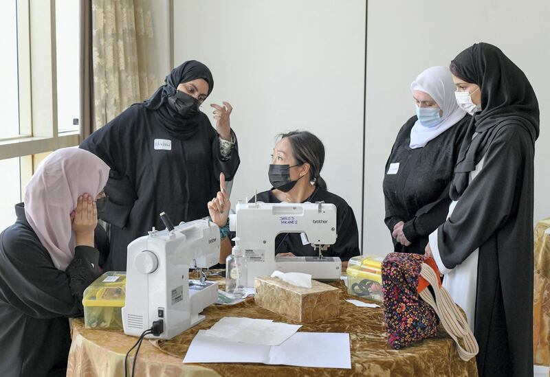 Lotus Training Centre-AD Centre, Theresa Tsui teaches low-income women from surrounding Middle eastern countries professional sewing to earn a living at Lotus Holistic Retal Training Centre on June 22, 2021. Khushnum Bhandari/ The National
Reporter: Haneen Dajani News
