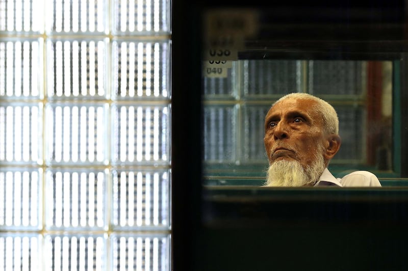 epaselect epa07718439 A Pakistani stockbroker monitors the latest share prices during a trading session at the Pakistan Stock Exchange (PSX) in Karachi, Pakistan, 15 July 2019. The benchmark PSX-100 index down 708.91 points at 32,963.58 at the mid-day session.  EPA/SHAHZAIB AKBER