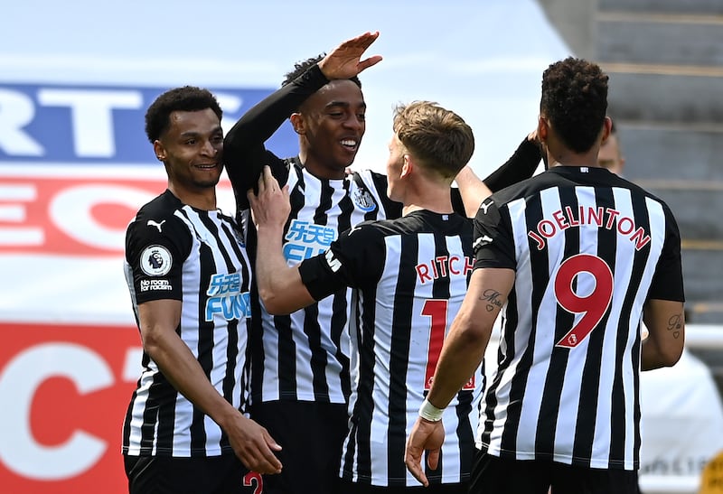Newcastle United's Joe Willock celebrates scoring their third goal with Matt Ritchie, Jacob Murphy and Joelinton against West Ham at St James' Park on Saturday, April 17. Reuters