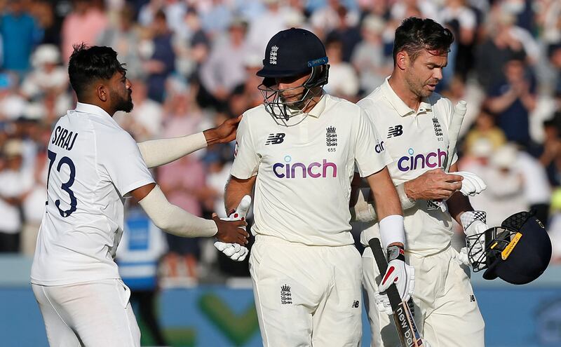 India's Mohammed Siraj congratulates England's captain Joe Root after the hosts were bowled out for 391.