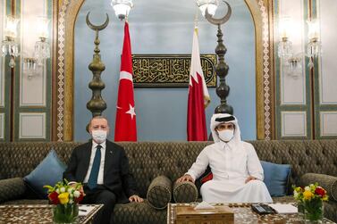 Turkish President Recep Tayyip Erdogan with Qatar's Emir Sheikh Tamim in Doha on Otober 7, 2020. AFP / Turkish Presidential Press Service