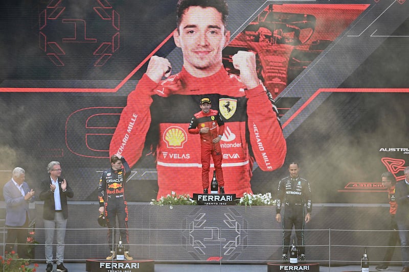 Left to right on podium: second placed Red Bull's Max Verstappen, winner Charles Leclerc of Ferrari and third placed Mercedes driver Lewis Hamilton. AFP