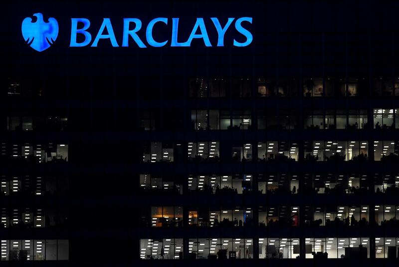 FILE PHOTO: Workers are seen in at Barclays bank offices in the Canary Wharf financial district in London, Britain, November 17, 2017. Picture taken November 17, 2017. REUTERS/Toby Melville/File Photo