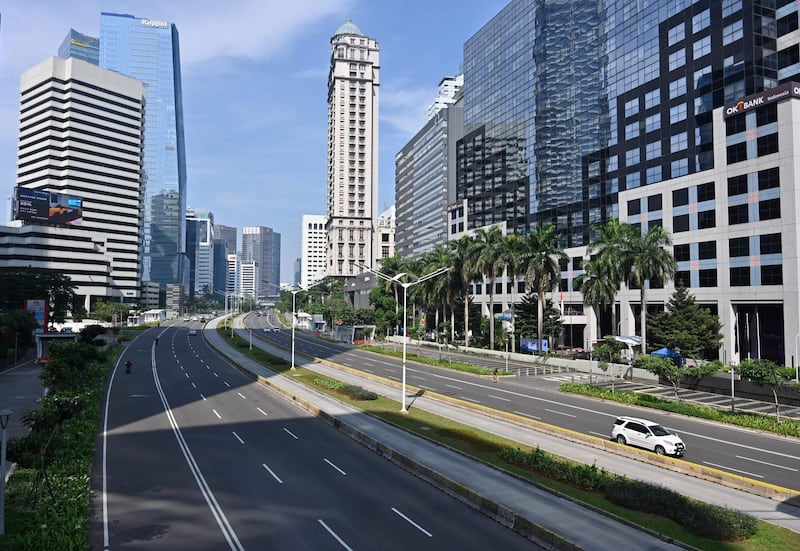 This picture shows a general view of the Sudirman street during a partial lockdown in Jakarta on June 1, 2020. / AFP / ADEK BERRY
