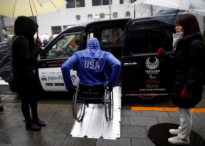 Paralympian Daniel Romanchuk of the U.S. enters a Toyota Motor Corp.'s JPN Taxi during his tour of Tokyo, Japan March 4, 2019. Picture taken March 4, 2019.   REUTERS/Issei Kato