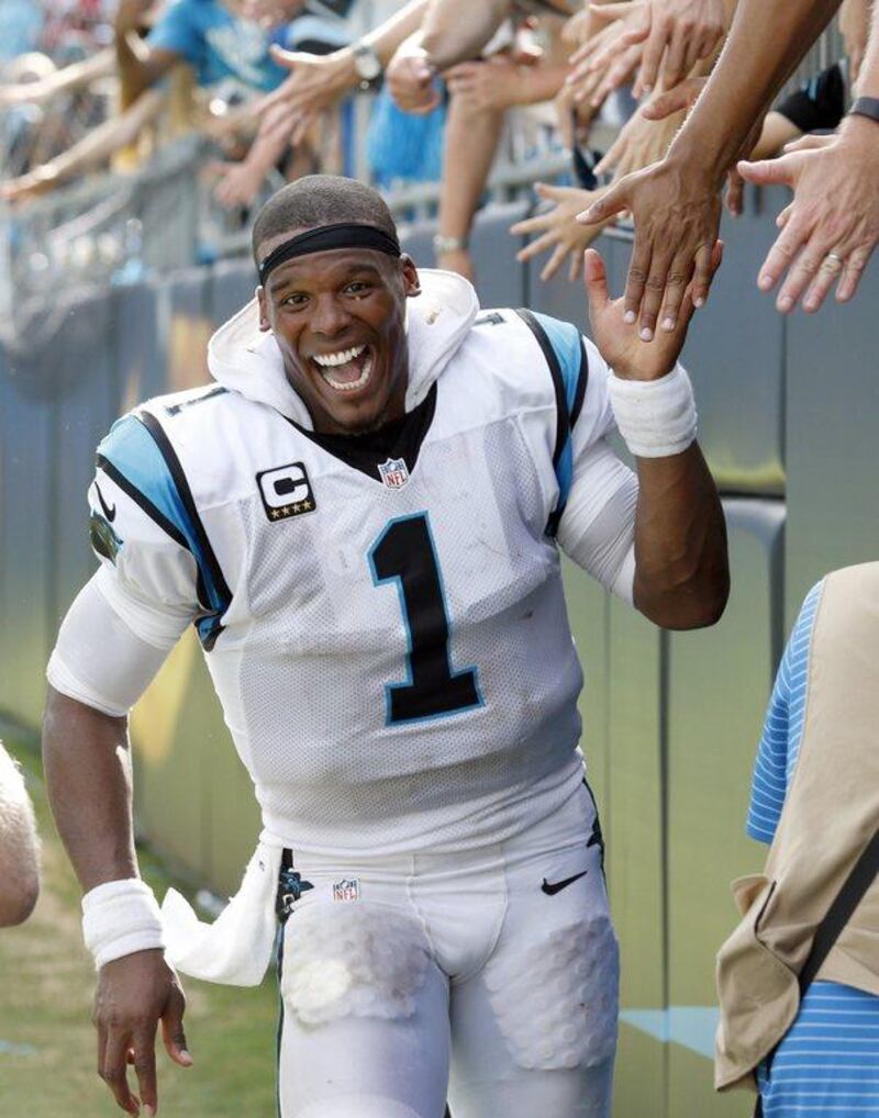 Carolina Panthers 46 San Francisco 49ers 27: Panthers quarterback Cam Newton celebrates the win. Bob Leverone / AP Photo