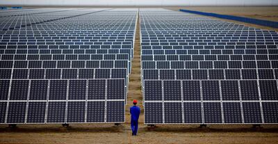 Solar panels in Gansu Province. China continues to use coal while being the fastest growing market for renewable energy. Reuters