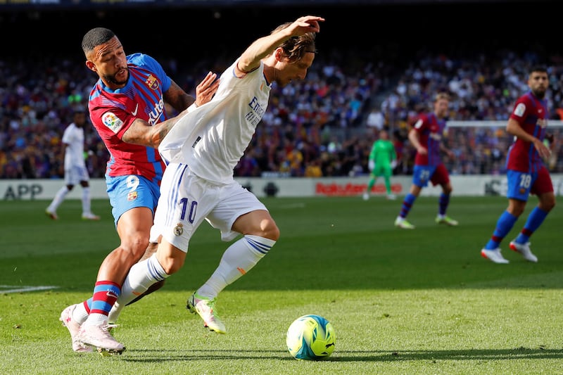 Luka Modric 8 - Looked unfazed by the Barcelona press and engineered ways to get out of it through passing and astute dribbling. Unlucky not to get an assist with an inventive pass that put the ball in a great spot for Benzema. EPA