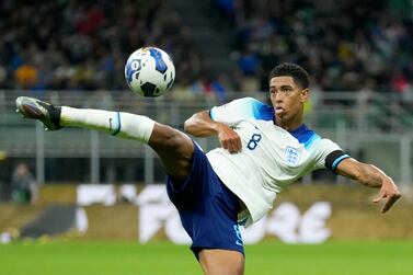 England's Jude Bellingham kicks the ball during the UEFA Nations League soccer match between Italy and England at the San Siro stadium, in Milan, Italy, Friday, Sept.  23, 2022.  (AP Photo / Antonio Calanni)