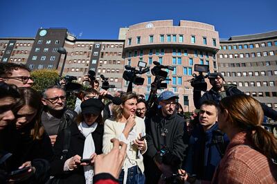 Reporters gathering at the San Raffaele Hospital in Milan, where Silvio Berlusconi was admitted. AFP