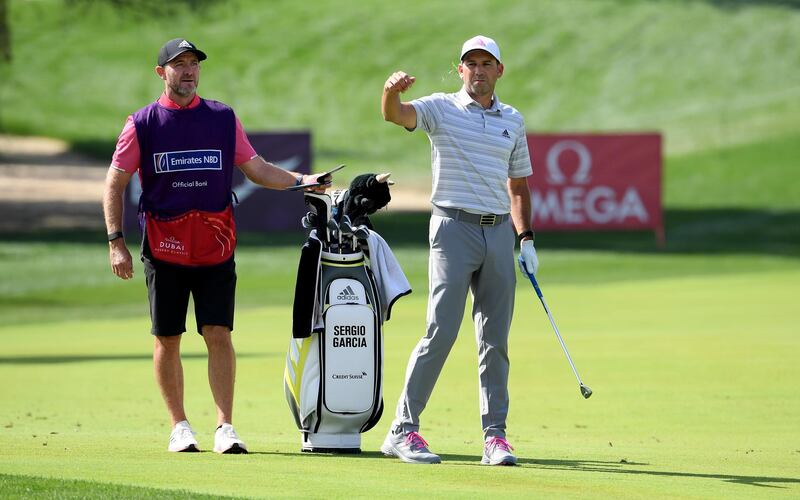 Sergio Garcia of Spain prepares to play his second shot on the first hole during the third round of the Omega Dubai Desert Classic at Emirates Golf Club on Saturday. Getty