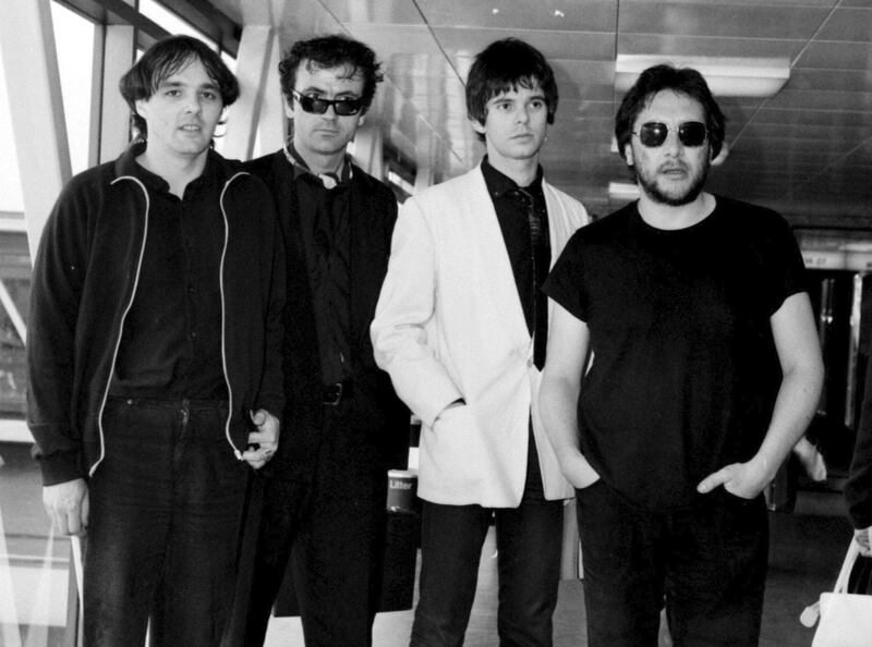FILE - In this July 6, 1980 file photo, from left, Dave Greenfield, Hugh Cornwell, Jean-Jacques Burnel and Jet Black of the group The Stranglers pose for a photo. Dave Greenfield, the keyboard player with British punk band The Stranglers and who penned the music to their biggest hit Golden Brown, has died after testing positive for coronavirus. He was 71. The band's official website announced that Greenfield died on Sunday, May 3, 2020 after contracting the virus following a stay in hospital for heart problems. (PA via AP, File)
