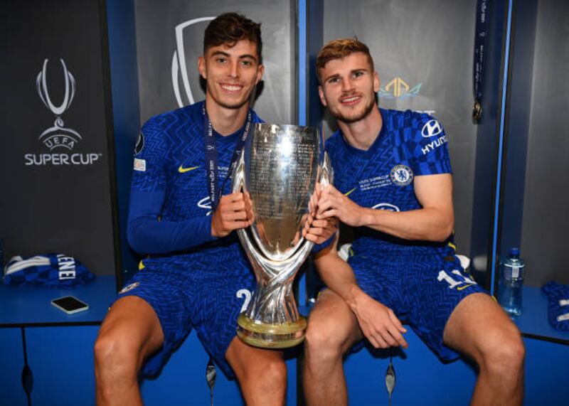 Kai Havertz and Timo Werner of Chelsea pose with the Uefa Super Cup Trophy.