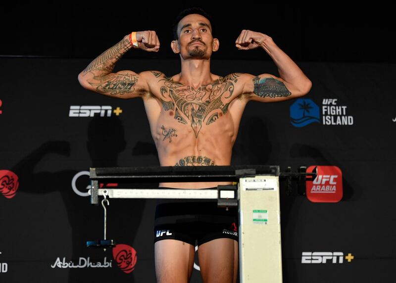 ABU DHABI, UNITED ARAB EMIRATES - JANUARY 15: Max Holloway poses on the scale during the UFC weigh-in at Etihad Arena on UFC Fight Island on January 15, 2021 in Abu Dhabi, United Arab Emirates. (Photo by Jeff Bottari/Zuffa LLC)