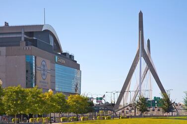 TD Garden, home arena of the Boston Bruins, and Leonard P. Zakim Bunker Hill Bridge, Boston, Massachusetts, USA