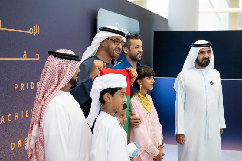 President Sheikh Mohamed and Sheikh Mohammed bin Rashid, Vice President and Ruler of Dubai, stand for a photograph with Dr Al Neyadi and family members. Photo: UAE Presidential Court 