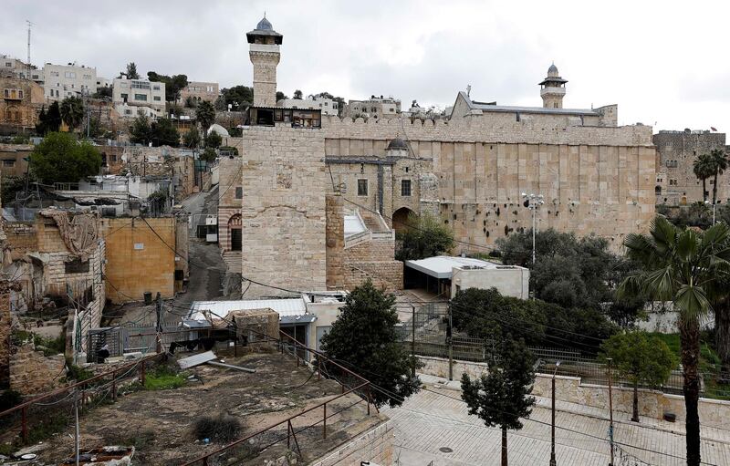 The Muslim Ibrahimi Mosque, adjoining the Jewish Tomb of the Patriarchs, is seen closed during Friday prayer over concerns of the spread of the coronavirus disease, in Hebron in the Israeli-occupied West Bank March 20, 2020. REUTERS/Mussa Qawasma