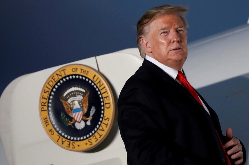 FILE PHOTO: U.S. President Donald Trump looks at supporters before boarding Air Force One after addressing a Trump 2020 re-election campaign rally in Montoursville, Pennsylvania, U.S. May 20, 2019.    REUTERS/Carlos Barria/File Photo