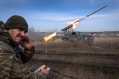 A Ukrainian officer fires a rocket towards Russian positions near the front line in Donetsk. AFP 