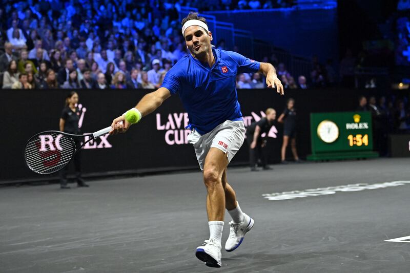 Roger Federer hits a return. AFP