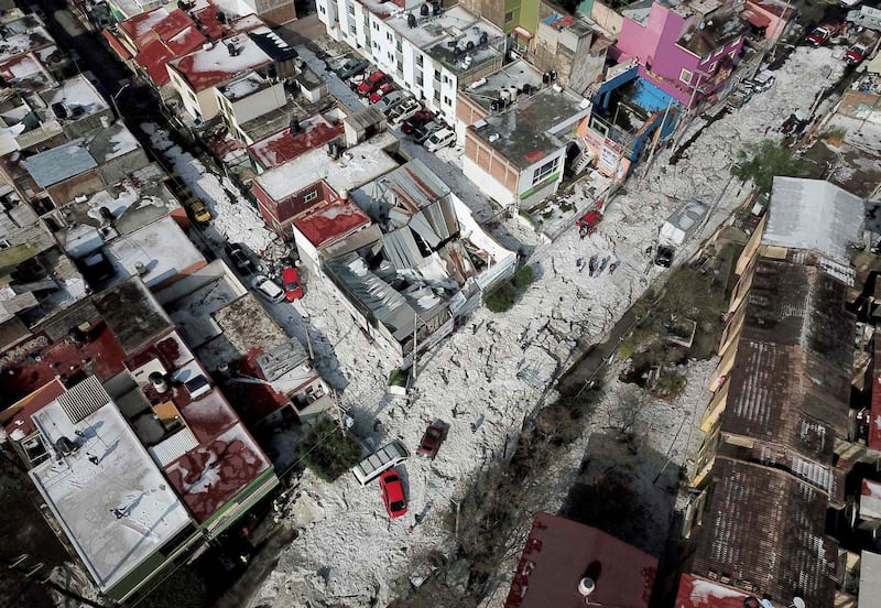 Aerial view of vehicles buried in hail in the streets in the eastern area of Guadalajara, Mexico. AFP