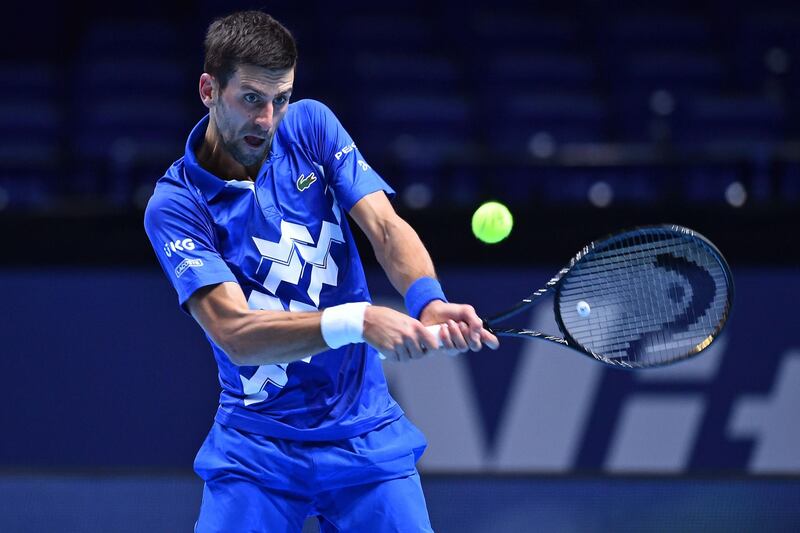 Serbia's Novak Djokovic returns against Argentina's Diego Schwartzman during their ATP Finals match at the O2 Arena in London. AFP