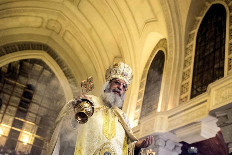 Egyptian Coptic Pope Tawadros II leads the Easter mass at the Saint Mark's Coptic Cathedral, in Cairo's al-Abbassiya district on April 15, 2017. / AFP PHOTO / KHALED DESOUKI