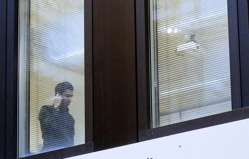 An office worker speaks on a mobile phone in a London office. Matthew Lloyd / Bloomberg