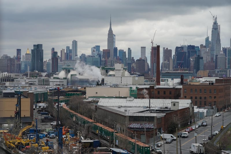 The Manhattan skyline rises over the Borough of Brooklyn on March 31, 2020 in New York. AFP