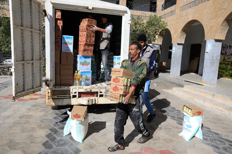 Fewer vulnerable families will receive food packages distributed by the WFP in Sanaa and elsewhere in Yemen. EPA