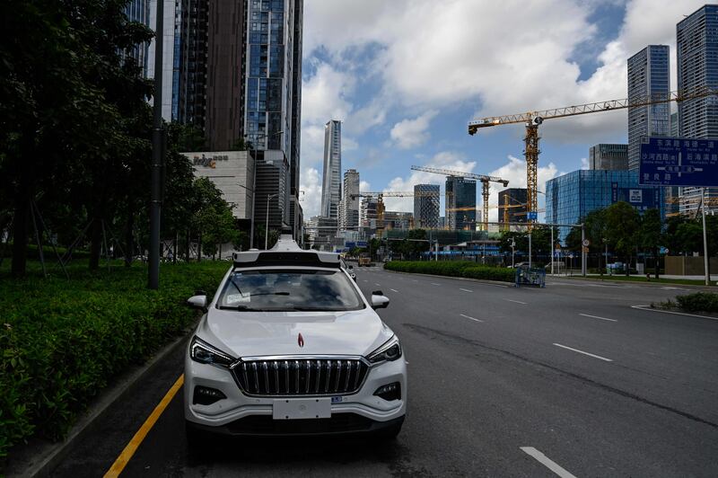 An Apollo Go robotaxi on a street in Shenzhen, in China’s southern Guangdong province. AFP