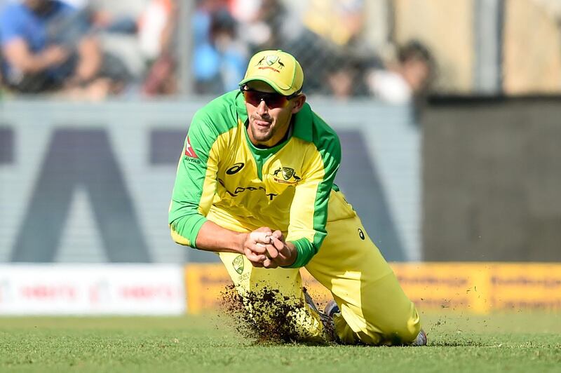 Australia's Asthon Agar takes the catch of India's Shikhar Dhawan at the Wankhede Stadium in Mumbai. AFP