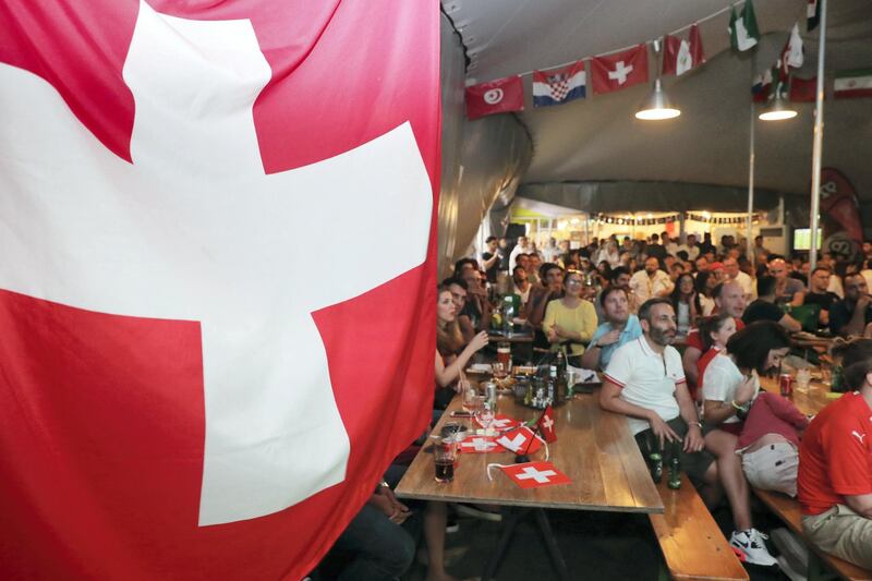 Dubai, United Arab Emirates - June 17th, 2018: Swiss fans during the game between Brazil and Switzerland. Sunday, June 17th, 2018 in Media One, Dubai. Chris Whiteoak / The National