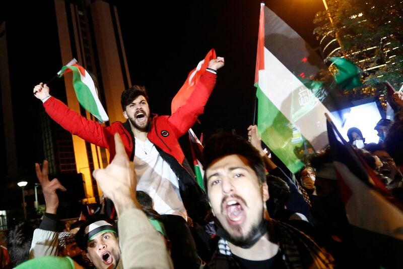 Pro-Palestinian demonstrators during a protest against Israel near the Israeli Consulate in Istanbul, Turkey. Reuters