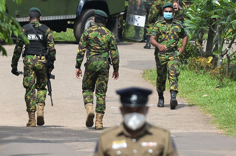 Special Task Force personnel deploy at Mahara prison on the outskirts of Colombo a day after a prison riot over the surge of coronavirus infections. AFP