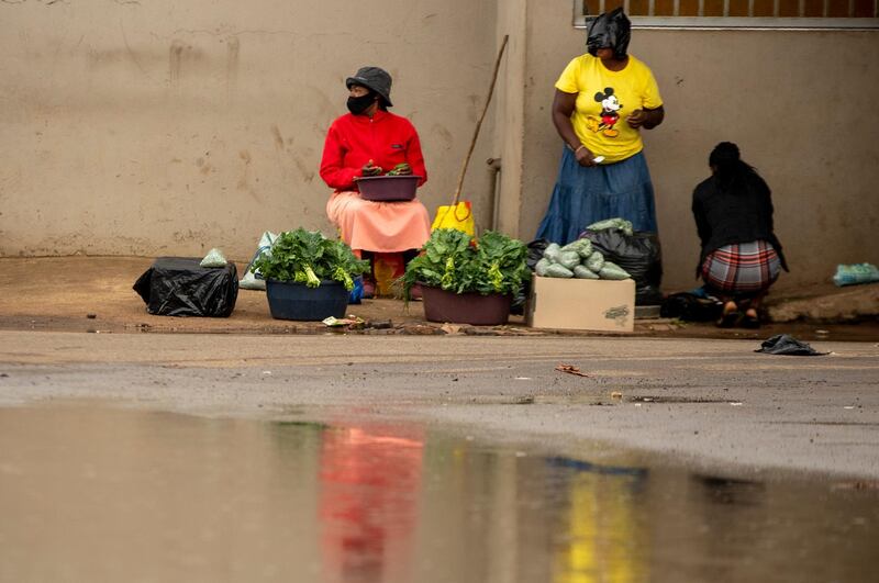 Street vendors sell vegetables on a pavement in Thokoza, east of Johannesburg, South Africa. AP Photo