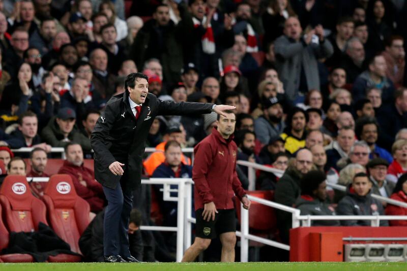 Arsenal manager Unai Emery gives instructions from the side line during the English Premier League soccer match between Arsenal and Tottenham Hotspur at the Emirates Stadium in London, Sunday Dec. 2, 2018. (AP Photo/Tim Ireland)