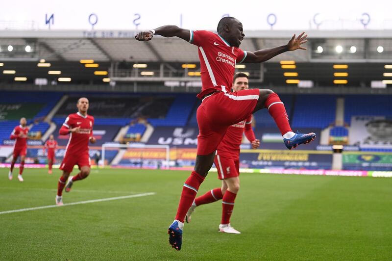 Liverpool striker Sadio Mane celebrates scoring after just three minutes. AFP