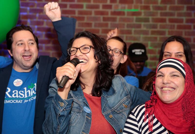 Democratic U.S. congressional candidate Rashida Tlaib celebrates with her mother at her midterm election night party in Detroit, Michigan, U.S. November 6, 2018. REUTERS/Rebecca Cook